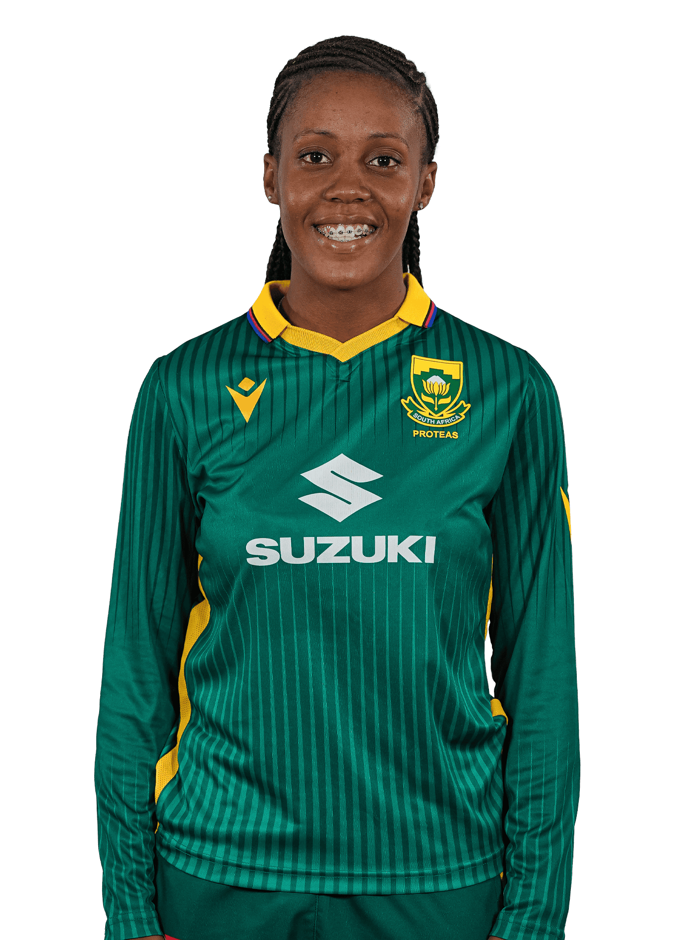 Female cricket player in green Proteas jersey with yellow accents, smiling at the camera, Suzuki sponsor on chest.